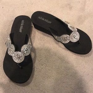 Black wedge flip flops